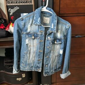 woman's blue denim jacket